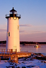 Portsmouth Harbor Light Guides Lobsterboat in Winter Sunset